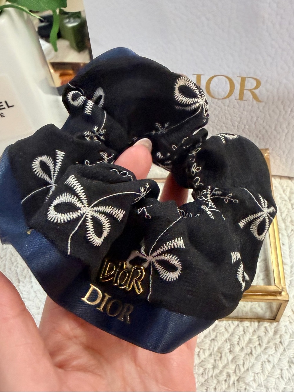 White embroidered bow pattern, black satin like Scrunchie Navy Logo Hair Tie